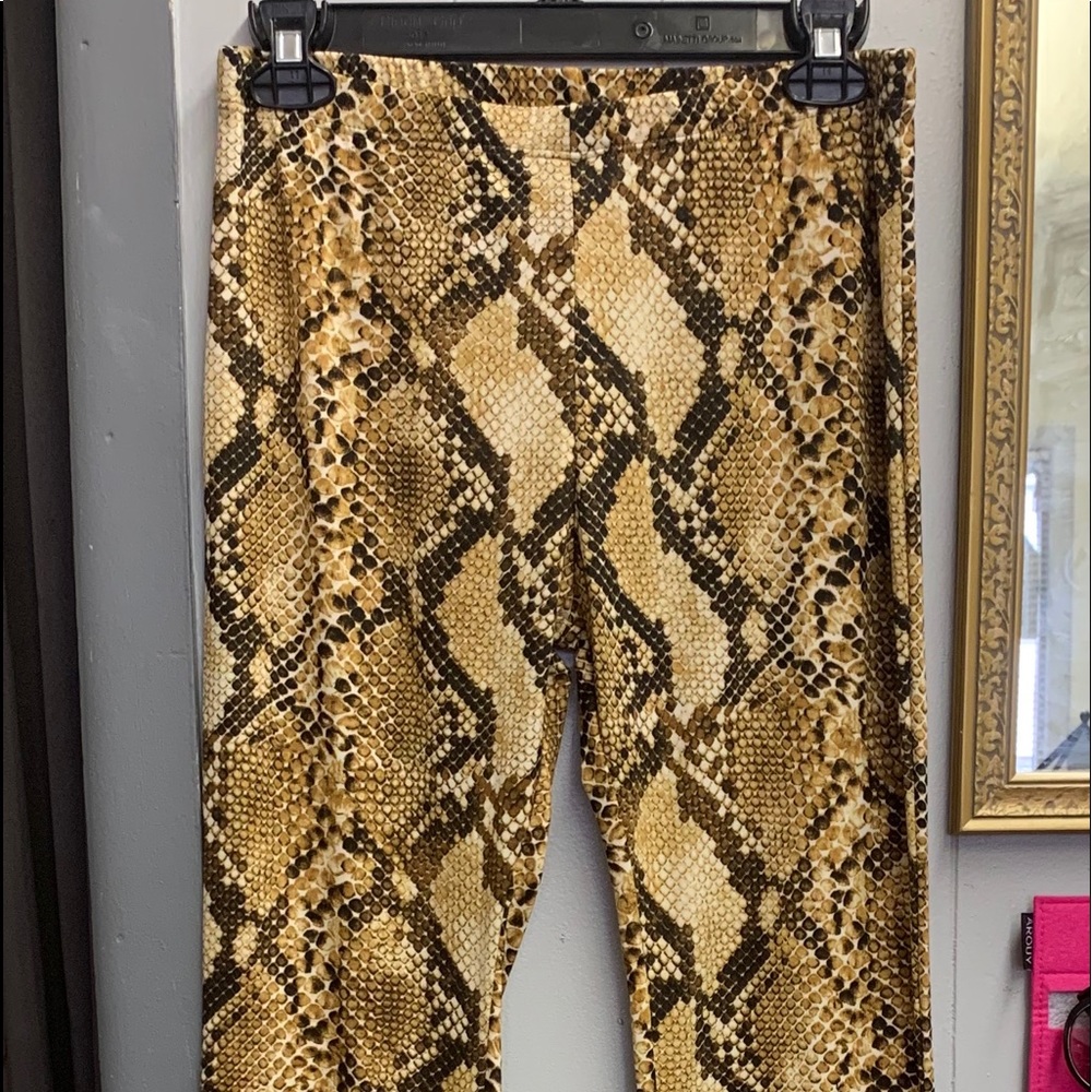 Snakeskin bell bottoms.